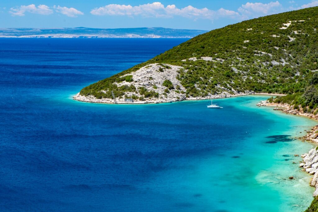 Beautiful beach on Losinj island, perfect for starting a boat rental adventure, Rent a Boat Losinj